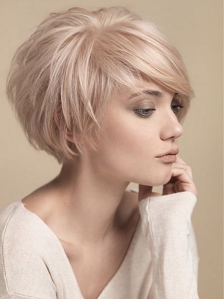 Paint a vibrant picture of a woman with a colorful pixie cut, showcasing  her bold and unique personality, generative ai 26535000 Stock Photo at  Vecteezy