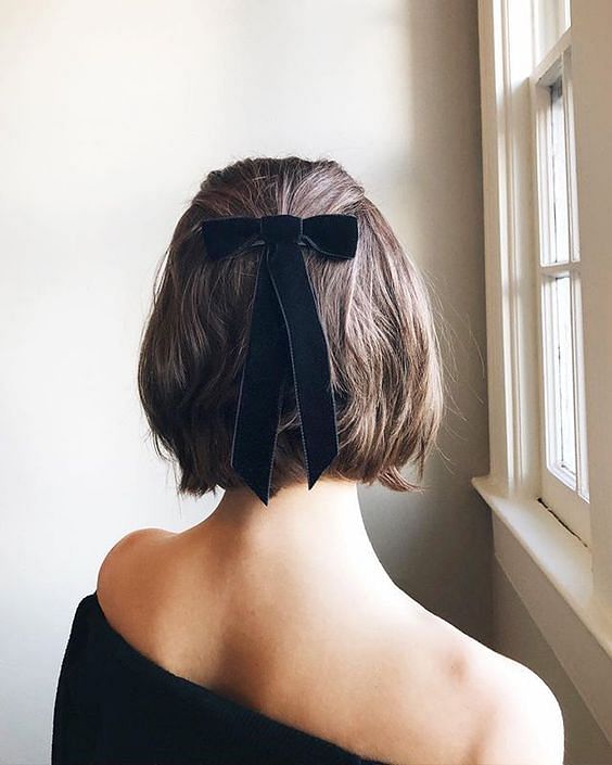 Love this easy half up, half down hair clip hack for extra volume