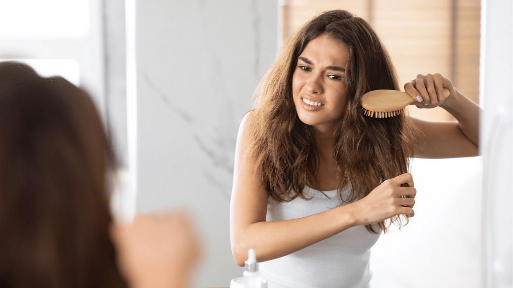 How To Make Frizzy Hair Smooth And Sleek Again