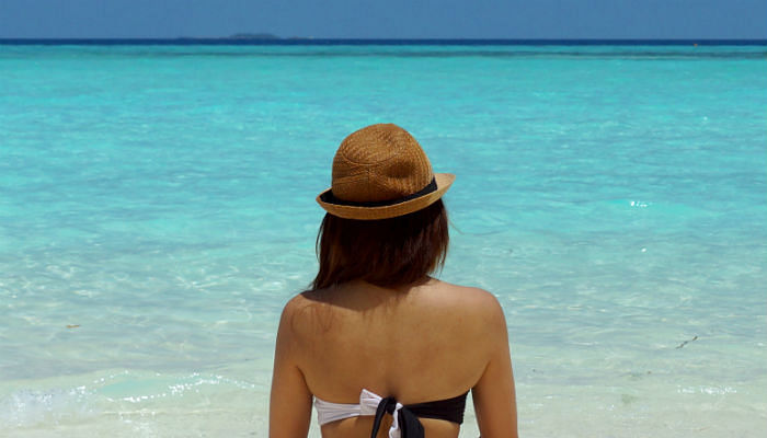 How To Protect Your Hair From Sun Damage-Wear a hat