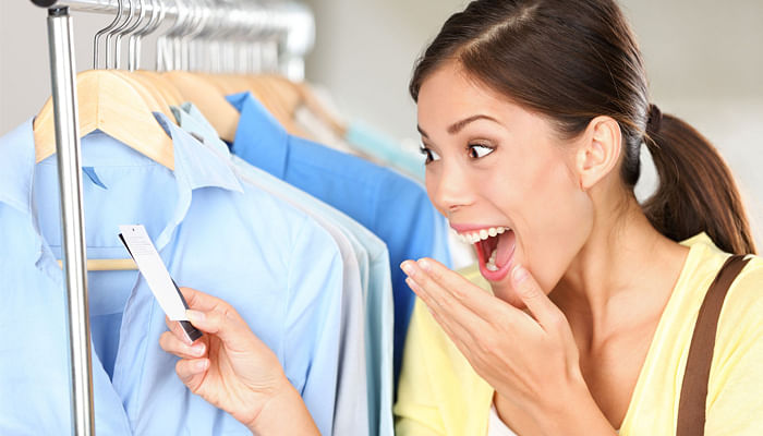 13506291-shopper-woman-surprised-over-sale-price-happy-asian-shopping-woman-surprised-over-rebate-prices-look-Stock-Photo